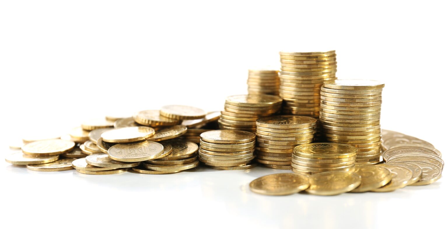 Pile of coins isolated on white